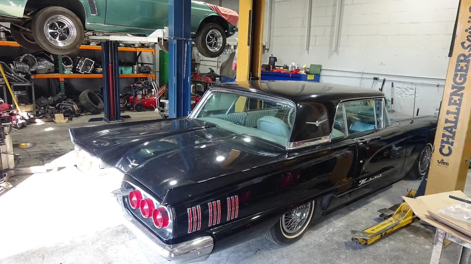 Classic car inside Vern's Transmission service bay