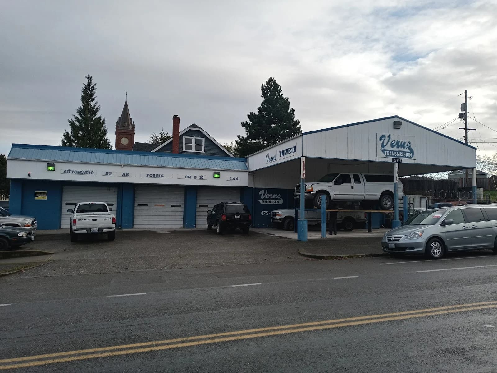 Wide exterior view of Vern's Transmission shop and service bays
